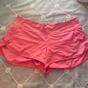 Lululemon coral speed up shorts size 8 length 2.5”